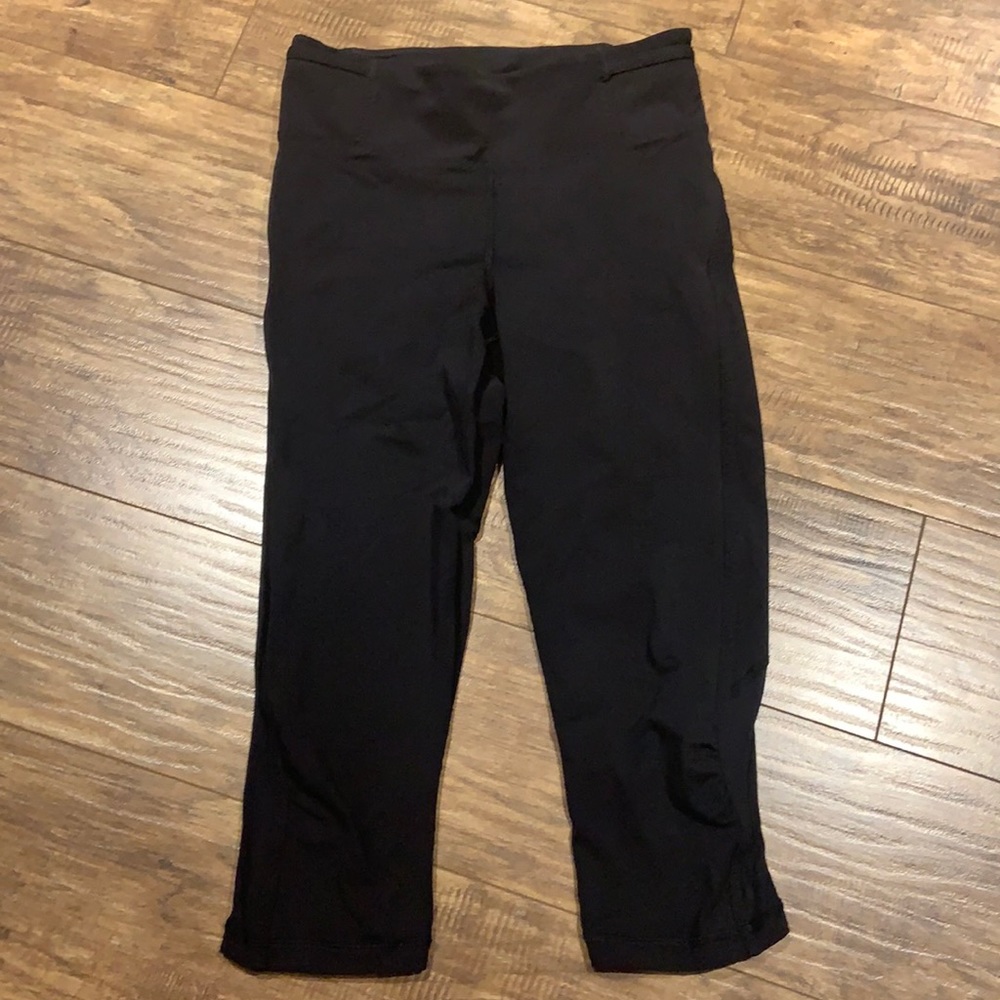 Lululemon black capris with partial mesh